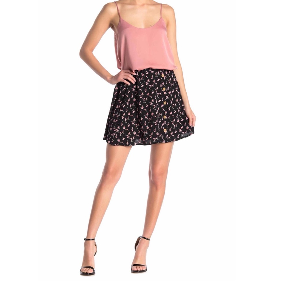 New flirty floral print mini skirt with button accent by Good Luck Gem